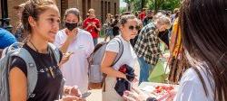 Image of students at an on-campus fair.